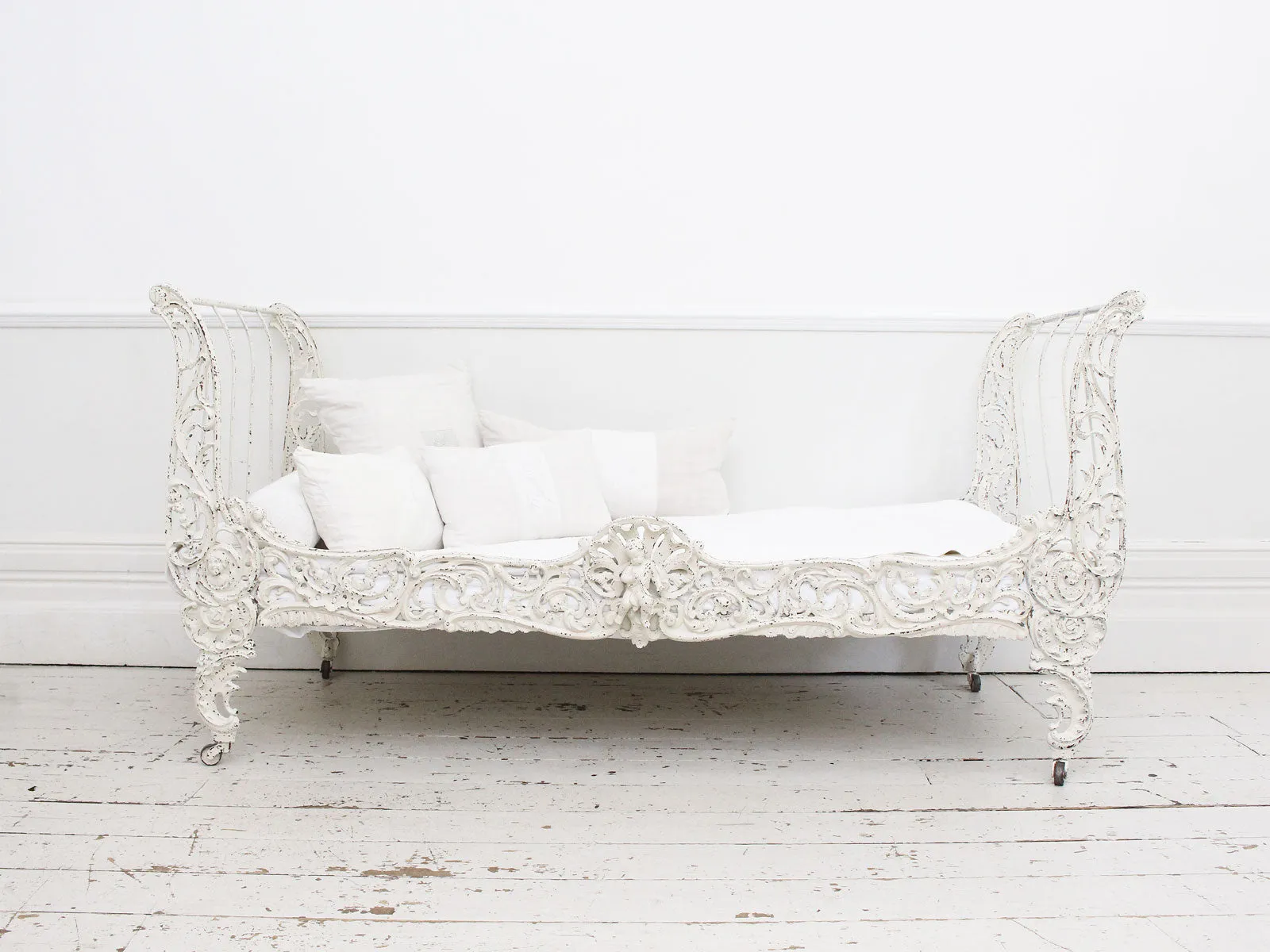 An Ornate 19th Century French Painted White Metal Daybed