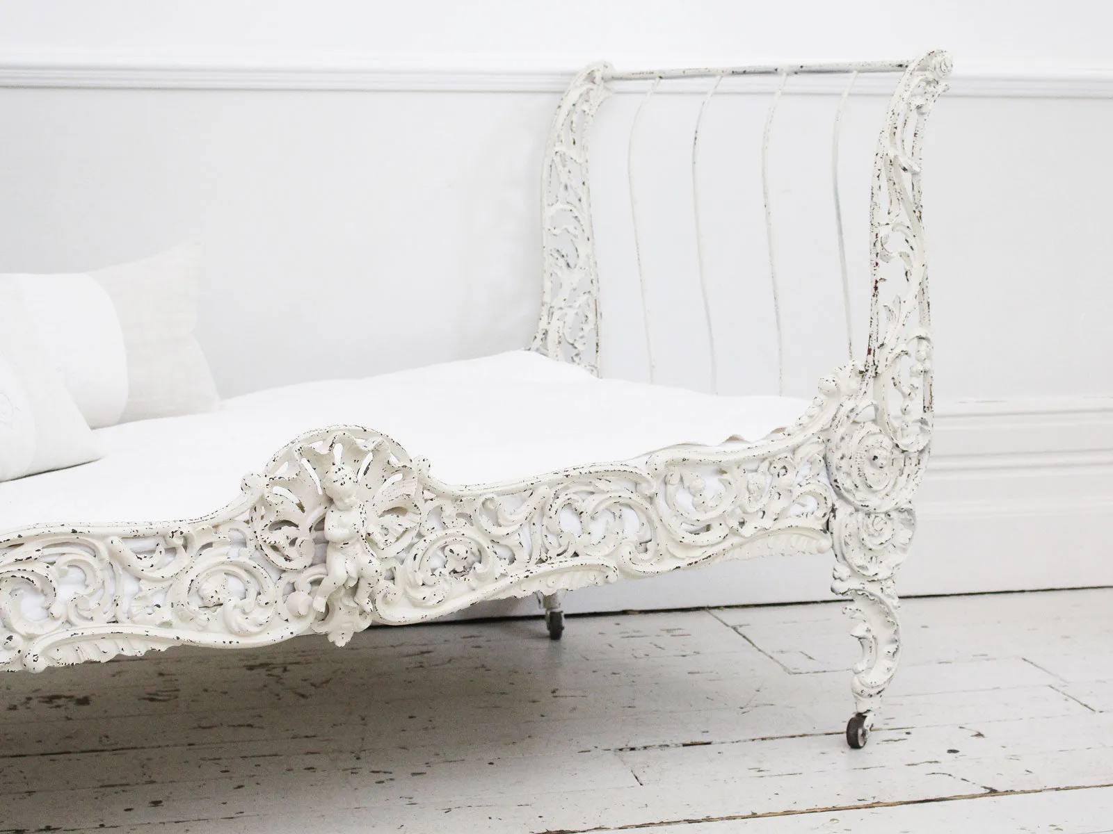 An Ornate 19th Century French Painted White Metal Daybed