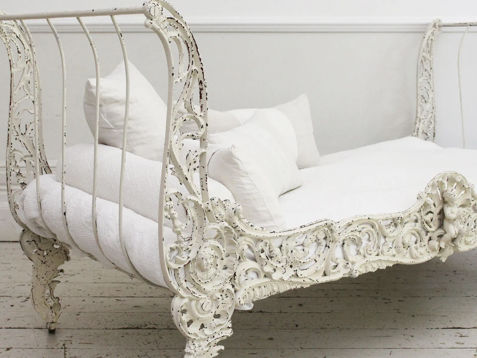 An Ornate 19th Century French Painted White Metal Daybed