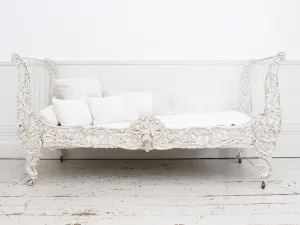 An Ornate 19th Century French Painted White Metal Daybed